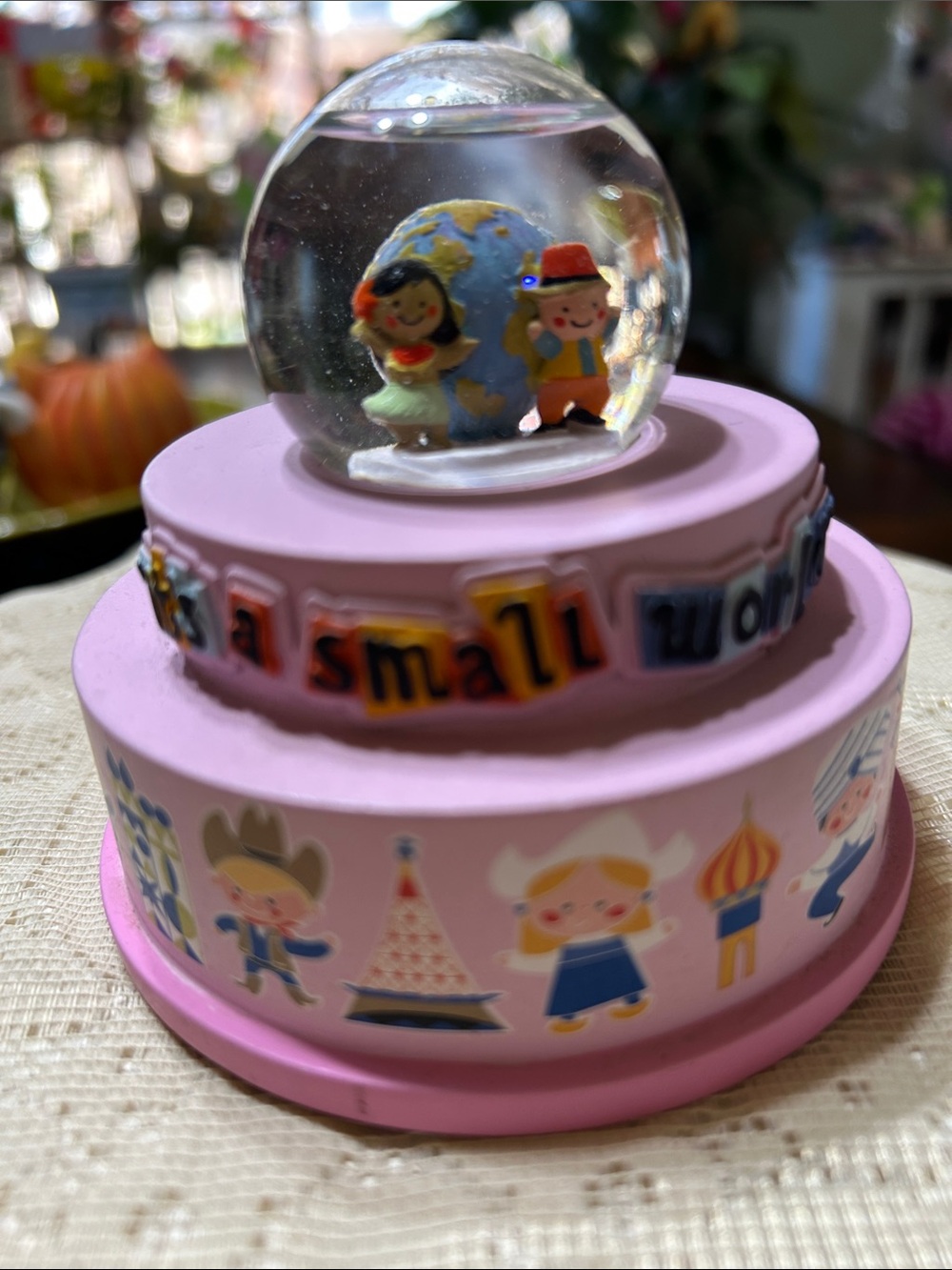 Disney Parks “It’s a Small World” Musical Snow Globe On a Tiered Pink Base - Picture 2 of 8